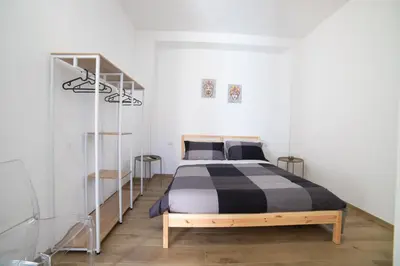 Letto o letti in una camera di Residence Le Tre Piazze