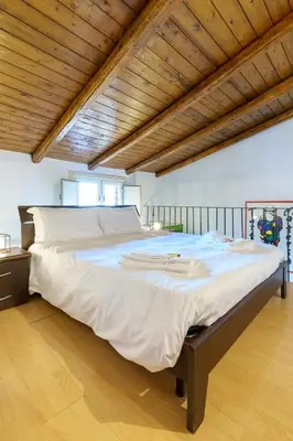 Letto o letti in una camera di Linda's House