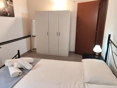 Letto o letti in una camera di La Casa dei Girasoli