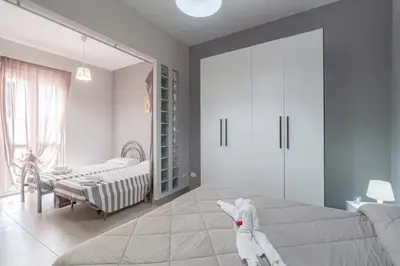Letto o letti in una camera di Casa Carlotta