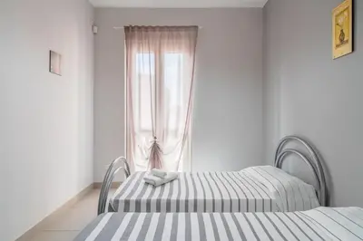 Letto o letti in una camera di Casa Carlotta