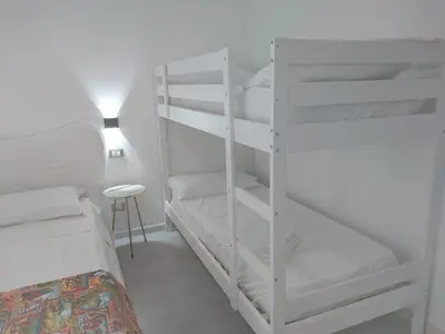 Letto o letti in una camera di Oasi tropicale