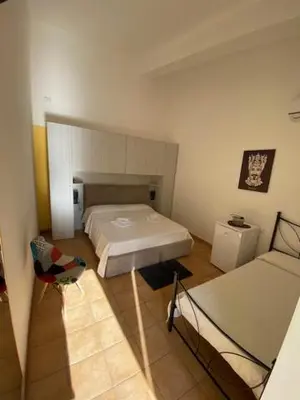 Letto o letti in una camera di B&B Quattromulini !!