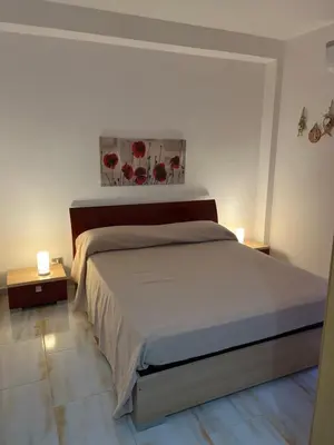 Letto o letti in una camera di La casetta