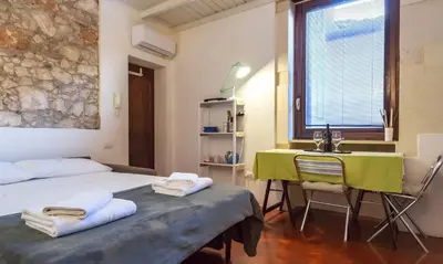 Letto o letti in una camera di Casa Eu - Studio Flat with Private Terrace WiFi