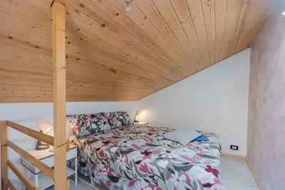 Letto o letti in una camera di Casa Giusi Terrace & Charm by Wonderful Italy