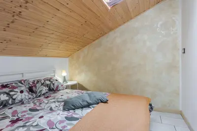 Letto o letti in una camera di Casa Bruno Terrace & Charm by Wonderful Italy