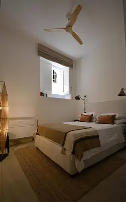 Letto o letti in una camera di Luxury Apartment in Historic Ortigia, Syracuse