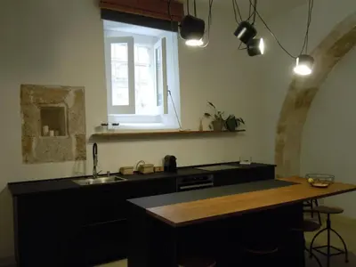Cucina o angolo cottura di Luxury Apartment in Historic Ortigia, Syracuse