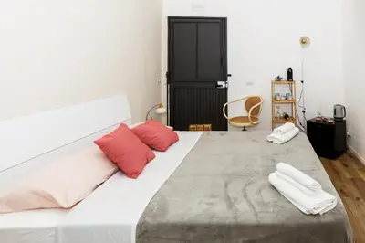 Letto o letti in una camera di Il Porto & I Marinai Rooms