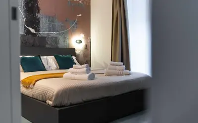 Letto o letti in una camera di Opera Boutique