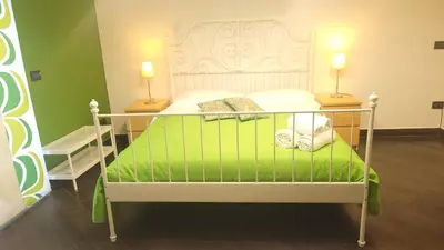 Letto o letti in una camera di XX Miglia rooms Catania city center