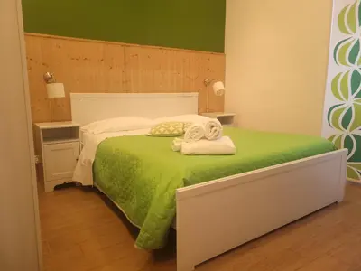 Letto o letti in una camera di XX Miglia rooms Catania city center