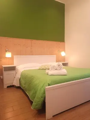 Letto o letti in una camera di XX Miglia rooms Catania city center