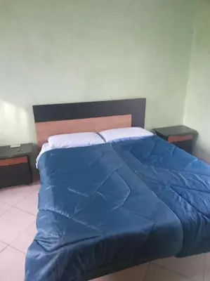 Letto o letti in una camera di Alimat Guesthouse