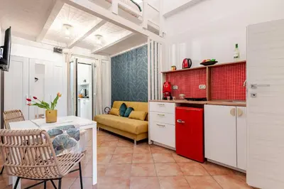 Cucina o angolo cottura di Sabbie dell'Etna - Eleganza e Comfort nel Cuore di Catania con Parcheggio Privato