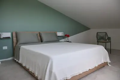 Letto o letti in una camera di I Secolari di Giulia