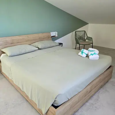 Letto o letti in una camera di I Secolari di Giulia