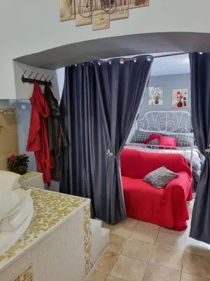 Letto o letti in una camera di Tora Sweet Love