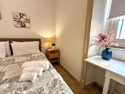Letto o letti in una camera di ChiaraLuce House