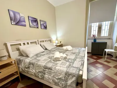Letto o letti in una camera di ChiaraLuce House