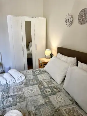 Letto o letti in una camera di ChiaraLuce House