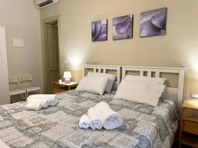 Letto o letti in una camera di ChiaraLuce House
