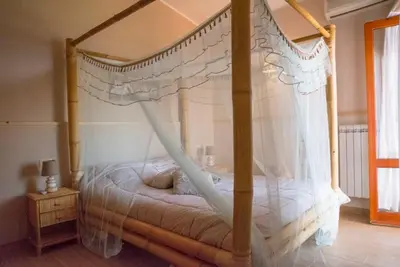 Letto o letti in una camera di SERENDIPITY VILLA sea view, sun and Etna