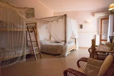 Letto o letti in una camera di SERENDIPITY VILLA sea view, sun and Etna
