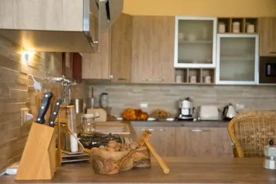 Cucina o angolo cottura di SERENDIPITY VILLA sea view, sun and Etna