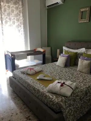 Letto o letti in una camera di Siracusa Vacanze