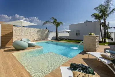 Piscina di ISULATRAVEL - Villa Amugea o nelle vicinanze