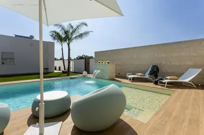 Piscina di ISULATRAVEL - Villa Amugea o nelle vicinanze