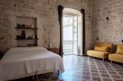 Letto o letti in una camera di Casa Catalé