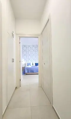 Letto o letti in una camera di MareCalmo Appartamento vista mare Ortigia