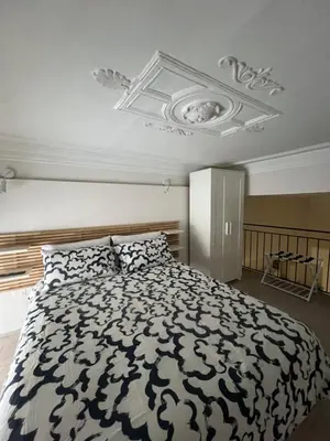 Letto o letti in una camera di La Bella Catania Home