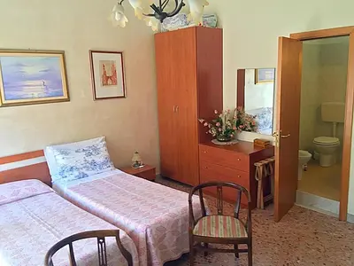 Letto o letti in una camera di B&B Gelone