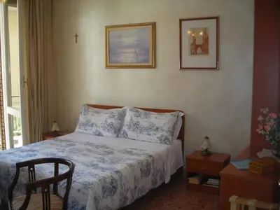 Letto o letti in una camera di B&B Gelone