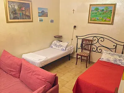 Letto o letti in una camera di B&B Gelone