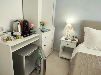 Letto o letti in una camera di Siracusa Ortigia by Duomo