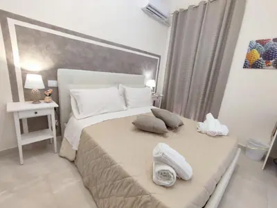 Letto o letti in una camera di Siracusa Ortigia by Duomo
