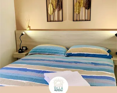 Letto o letti in una camera di Villa Marina - Baia Ciriga, Pozzallo