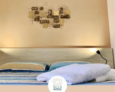 Letto o letti in una camera di Villa Marina - Baia Ciriga, Pozzallo