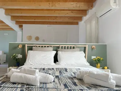 Letto o letti in una camera di Loft Sicily's Land 50 meters from the sandy beach