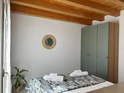 Letto o letti in una camera di Loft Sicily's Land 50 meters from the sandy beach