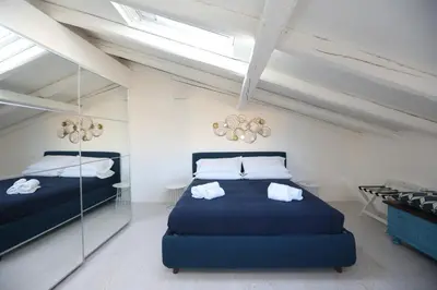 Letto o letti in una camera di Ortigia Sea Charme by Ortigia Apartments