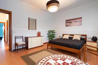 Letto o letti in una camera di Bombana Beach Apartments