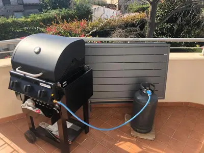 Attrezzature per barbecue disponibili per gli ospiti dell'appartamento