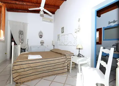 Letto o letti in una camera di Il Casale Residence