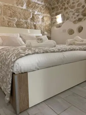 Letto o letti in una camera di La Casa di Marta